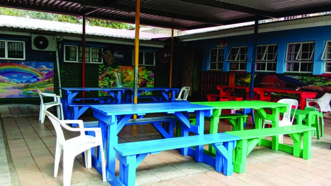 Colourful courtyard tables
